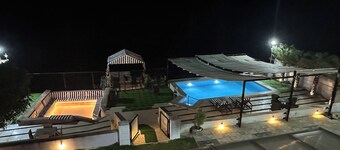 3-bedroom farmhouse in charming Kharivali with AC, WiFi. Enjoy a cozy stay