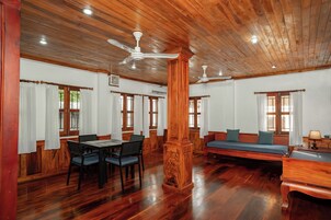 Deluxe Apartment | Living area | 32-inch flat-screen TV with digital channels