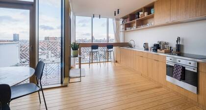 Duplex neuf au dernier étage avec vue imprenable dans le quartier branché de Sai