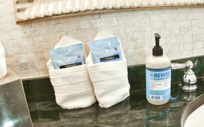 Hair dryer, towels, soap, shampoo