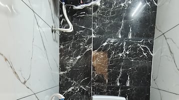 Shower, towels, soap, shampoo