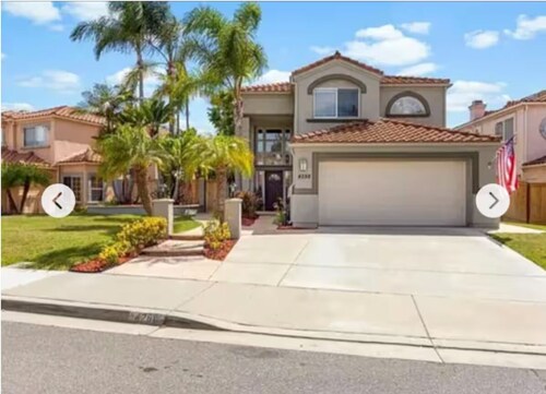 Spacious 4-bedroom house with hot tub and spa-like backyard. Home away from home