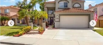 Spacious 4-bedroom house with hot tub and spa-like backyard. Home away from home