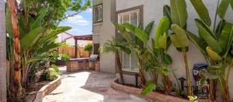 Spacious 4-bedroom house with hot tub and spa-like backyard. Home away from home