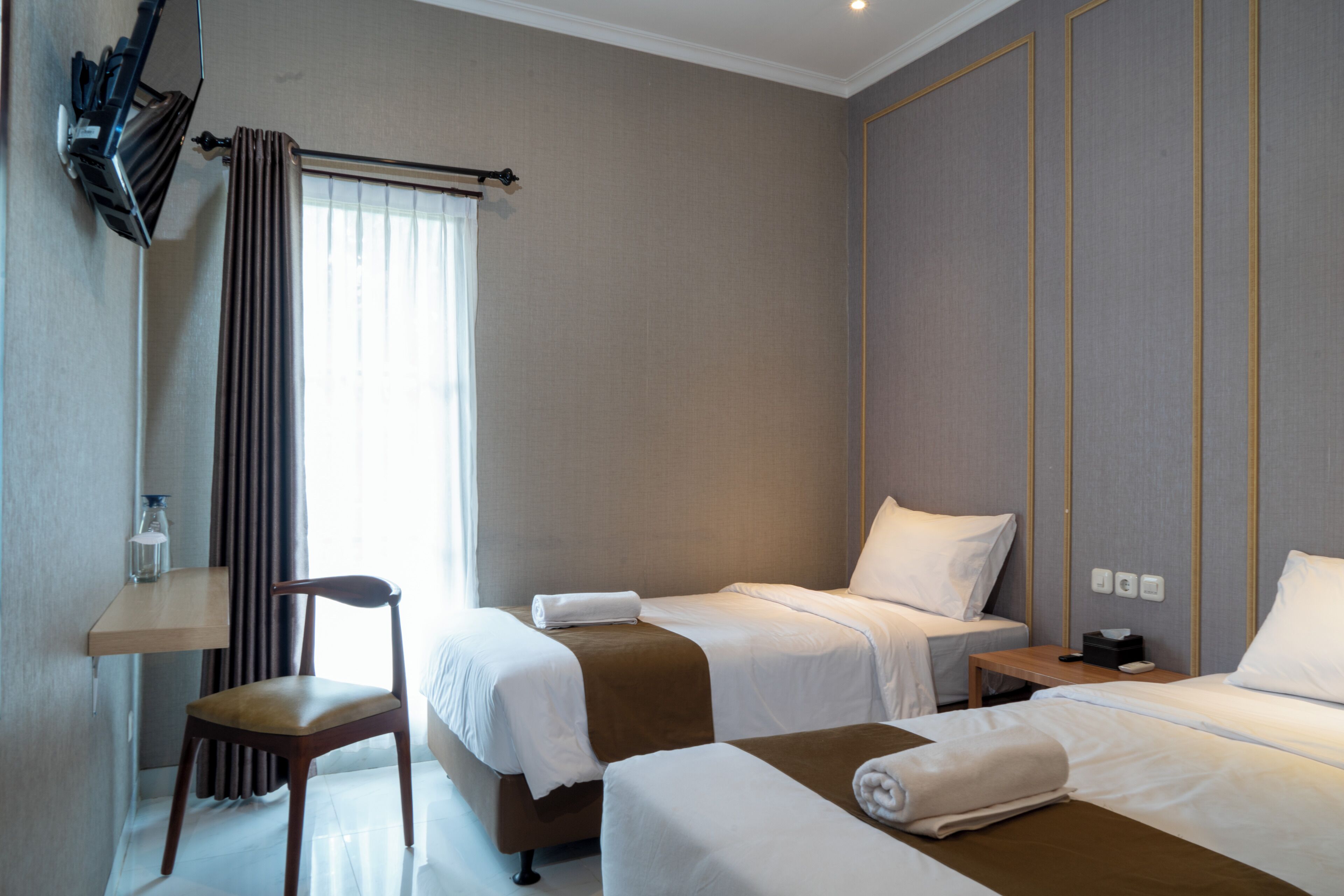 Superior Twin kamer, uitzicht op tuin | Een bureau, extra bedden, gratis wifi, beddengoed