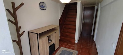 Pretty town house located next to the medieval town of Penela and its castle.