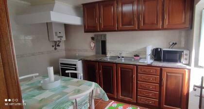 Pretty town house located next to the medieval town of Penela and its castle.