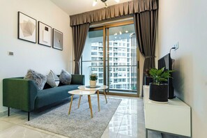 Premium Apartment | Desk, laptop workspace, blackout drapes, soundproofing