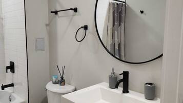 Hair dryer, towels, soap, toilet paper