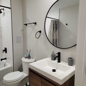 Hair dryer, towels, soap, toilet paper