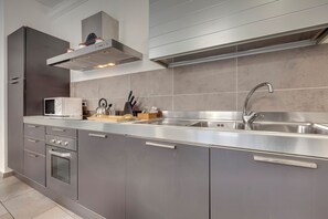 Apartment, Balcony | Private kitchen | Electric kettle - Mamo Florence - Santo Stefano Apartment (Florence)