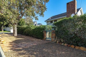 Studio, 2 Bedrooms, Smoking, Patio | Property grounds - Charming Garden Cottage, Campsbay, Cape Town (Cape Town)