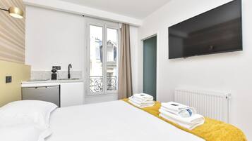 Desk, free WiFi, bed sheets