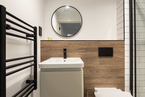 Shower, free toiletries, hair dryer, towels