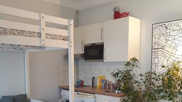 Iron/ironing board, travel crib, free WiFi, bed sheets