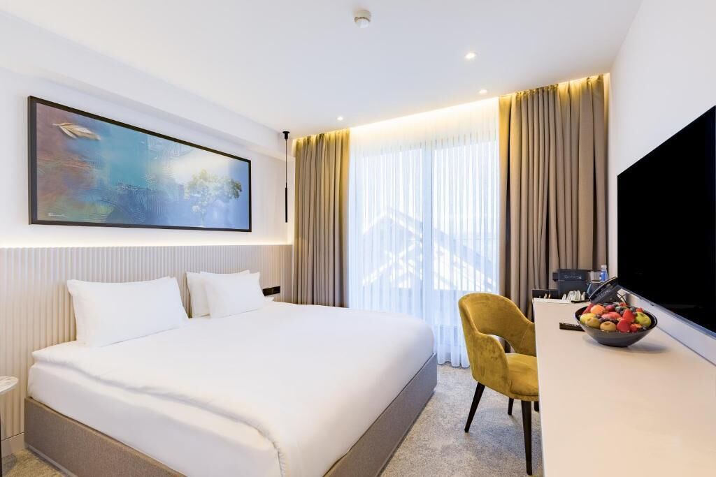 Literie de qualité, lit avec matelas Select Comfort, minibar