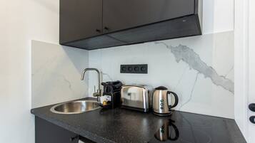 Fridge, stovetop, coffee/tea maker, toaster