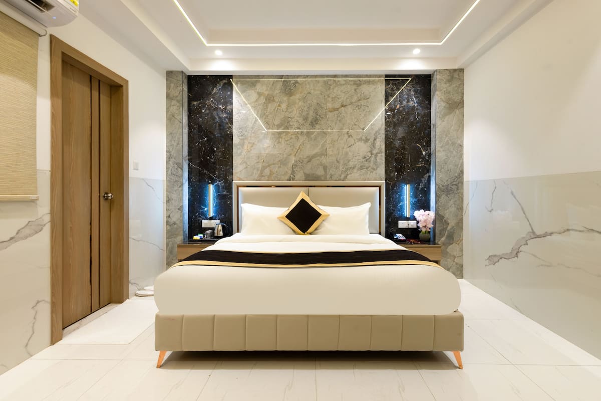 Habitación individual Deluxe | Caja de seguridad en la habitación y tabla de planchar con plancha