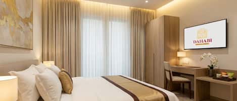 Habitación individual Deluxe | Caja de seguridad en la habitación y tabla de planchar con plancha