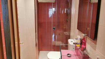 Shower, towels, toilet paper
