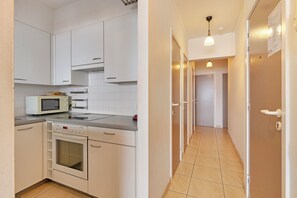 Fridge, stovetop, electric kettle, toaster