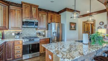 Dishwasher, coffee/tea maker, highchair, cookware/dishes/utensils