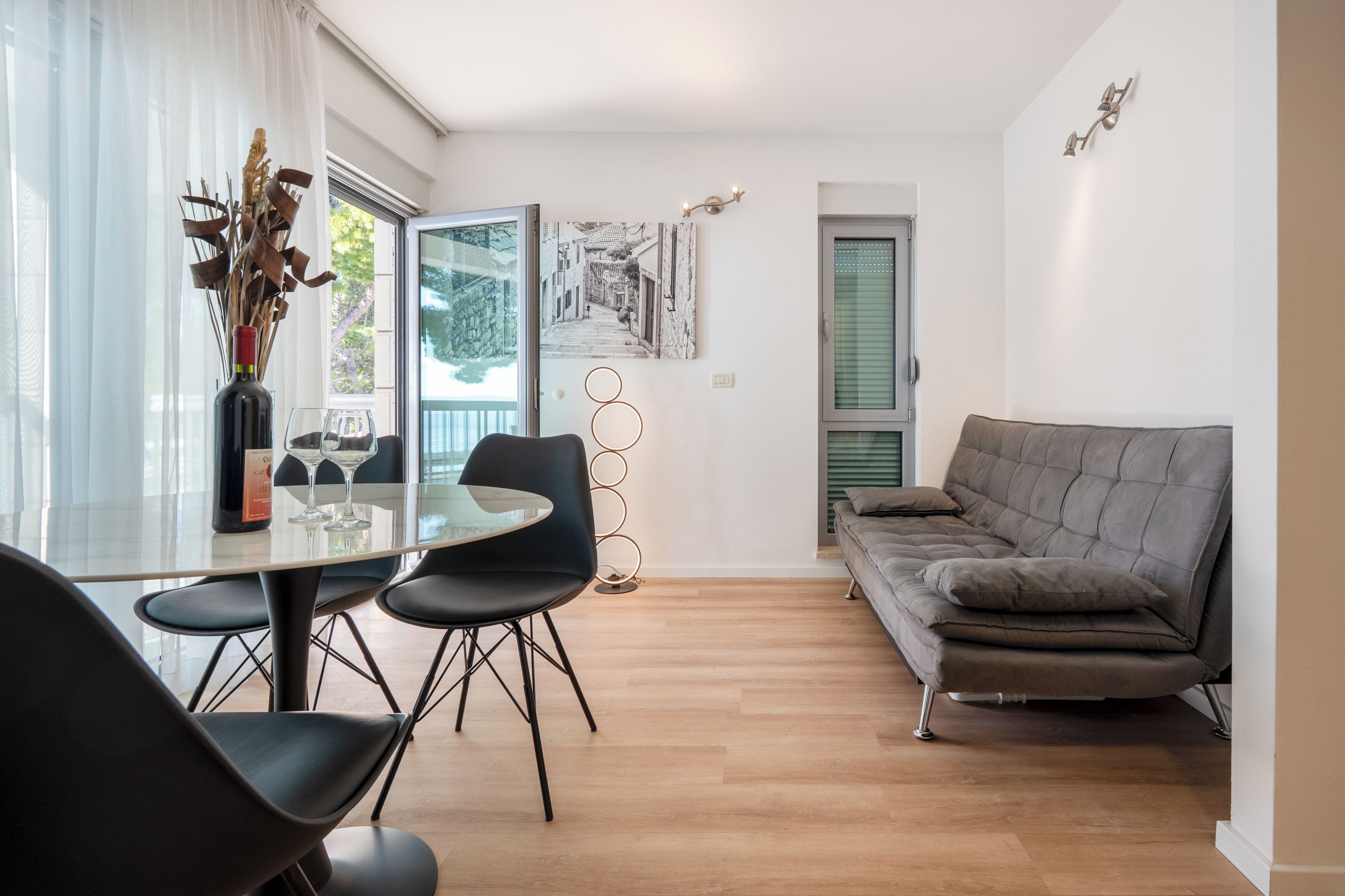 Family Apartment, Balcony, Sea View | Living area | 98-cm TV with satellite channels