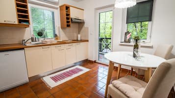 Apartment (Standard One Bedroom Apartment with T) | Private kitchen | Fridge