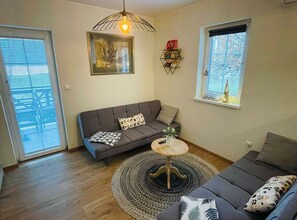 Apartment (Classic One Bedroom Apartment with Te) | Living room - Rustic and Radiant Retreat Apartments With Terrace (Podcetrtek)