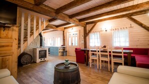 House (Two Bedroom Holiday Home with Sauna) | Living room | 32-inch flat-screen TV with cable channels - Serene Rustic Haven Holiday Home With Sauna (Bistrica ob Sotli)