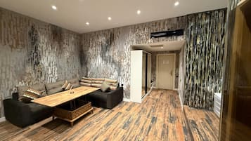 Chambre Double Luxe, balcon | Coin séjour