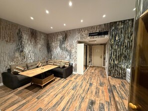 Chambre luxueuse double, balcon | Aire de séjour