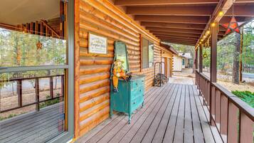 Step out onto the covered porch and enjoy the peaceful surroundings.
