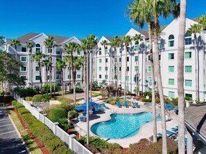 Outdoor pool, a heated pool - Disney Area Condo, 2 Queen Beds, Full Kitchen, Free Park Shuttle (Orlando)