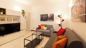 Comfort Apart Daire | Oturma alanı | Dijital TV kanalları bulunan 50 inç akıllı televizyon 