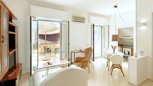 A spacious living area with a large window, a dining table, and a kitchen area. - Solemar Sicilia - Terrazza del Merlo (Palermo)