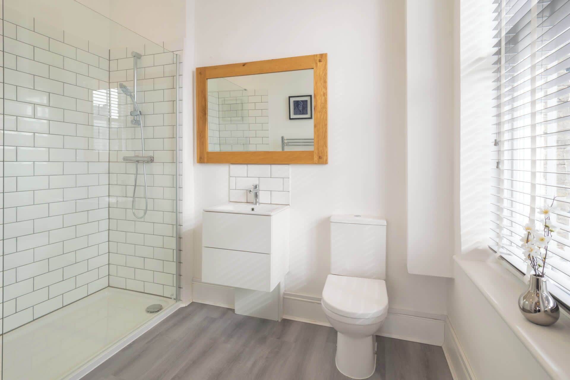 Shower, hair dryer, towels, shampoo