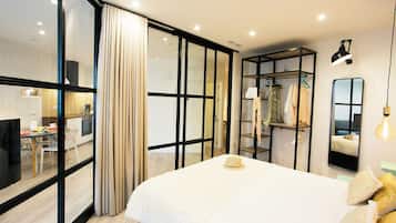 Superior Suite | 1 bedroom, in-room safe, laptop workspace, blackout curtains