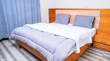 Departamento Confort, 2 habitaciones, para fumadores, vista a la ciudad | 2 habitaciones, wifi gratis y ropa de cama