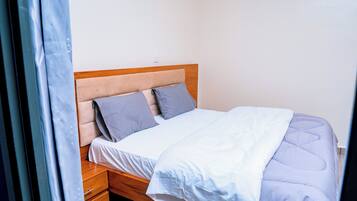 Departamento Confort, 2 habitaciones, para fumadores, vista a la ciudad | 2 habitaciones, wifi gratis y ropa de cama