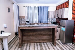 Comfort Apartment, 2 Bedrooms, Smoking, City View | Private kitchen | Coffee/tea maker - Kadoo Travels (Kigali)