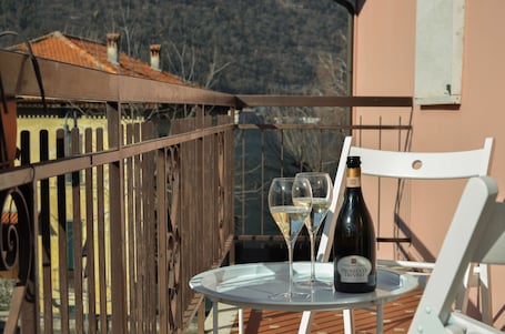 Outdoor dining. Just a dip away from Lake Iseo is this beautiful apartment