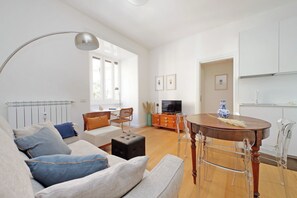 Apartment | Living area | 36-inch flat-screen TV with cable channels - YCH Delightful flat near San Giovanni (Rome)