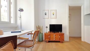 Apartment | Living area | 36-inch flat-screen TV with cable channels