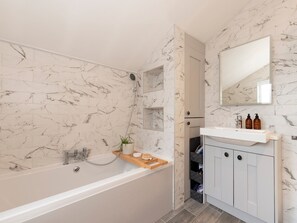 Shower, hair dryer, towels