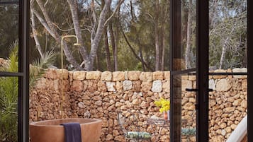 Triple Room, Patio, Garden View | In-room safe, blackout drapes, iron/ironing board, free WiFi