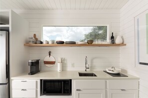 Microwave, coffee/tea maker, cookware/dishes/utensils