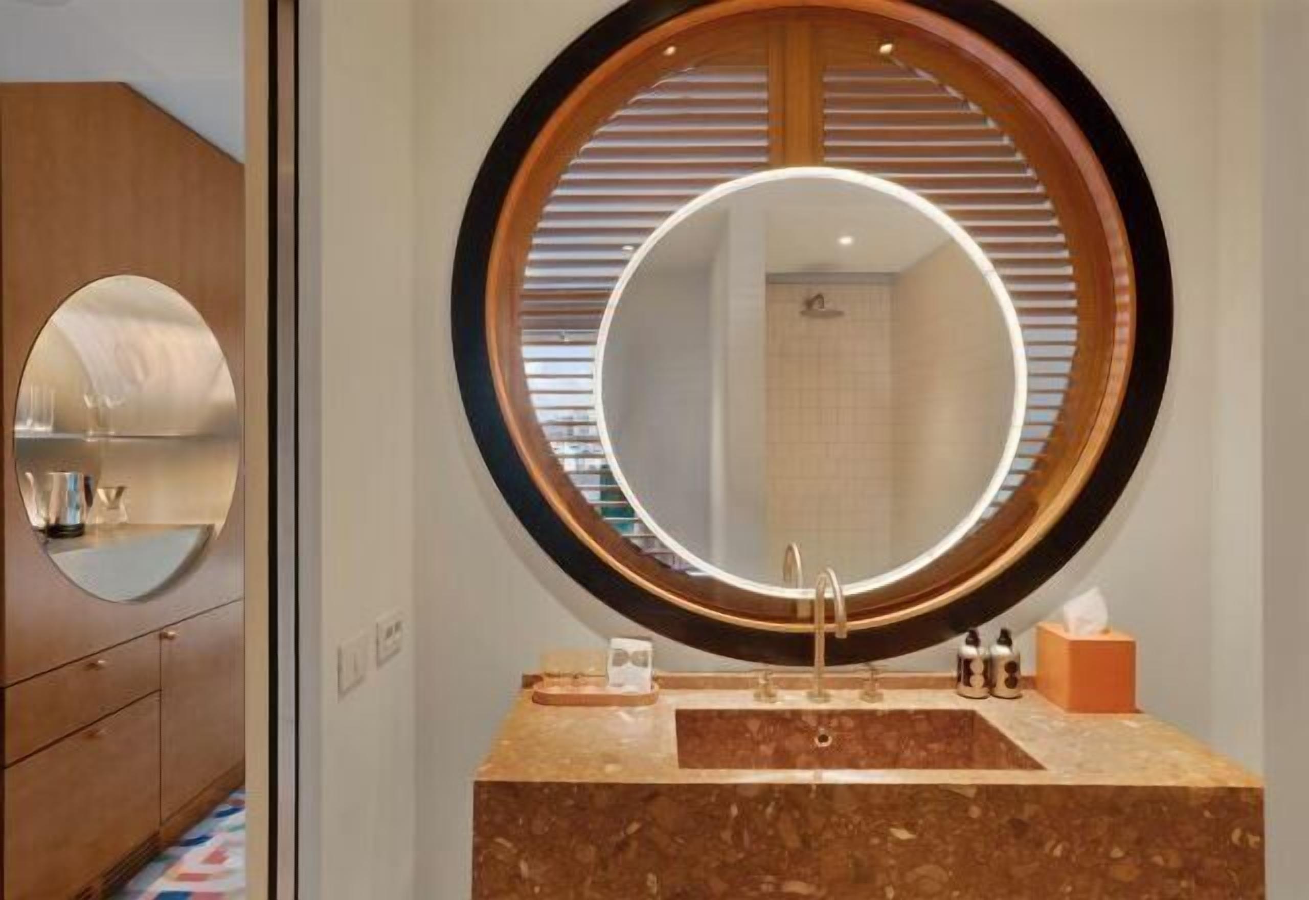 Eco-friendly toiletries, hair dryer, bathrobes, slippers