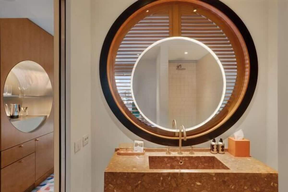 Eco-friendly toiletries, hair dryer, bathrobes, slippers