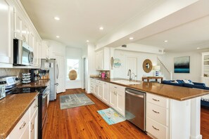 Fridge, microwave, oven, stovetop - Pet Friendly, Beachside in Pirates Beach, Great Primary Suite & Large Deck (Galveston)